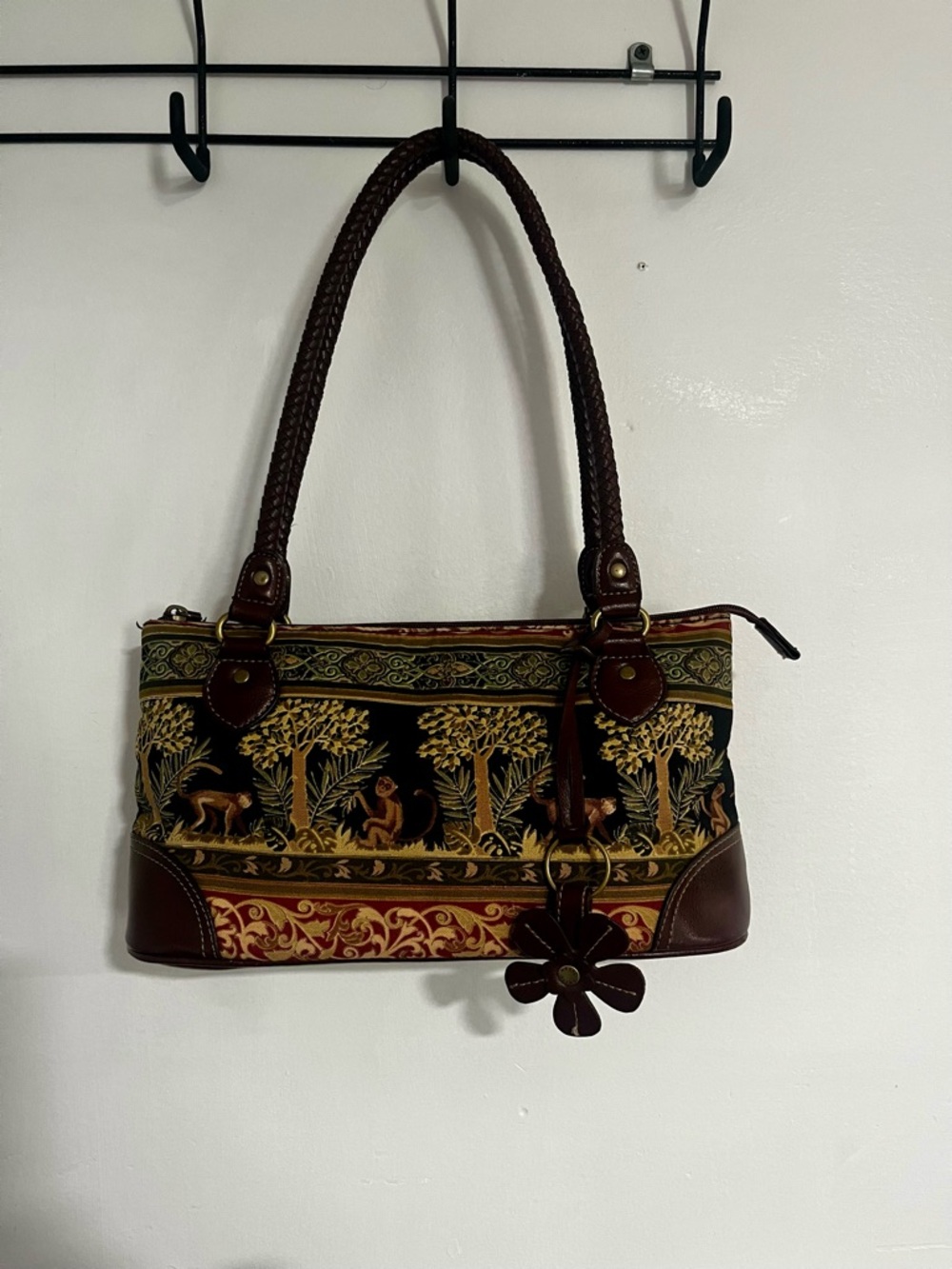 Relic monkey and forest shoulder purse.